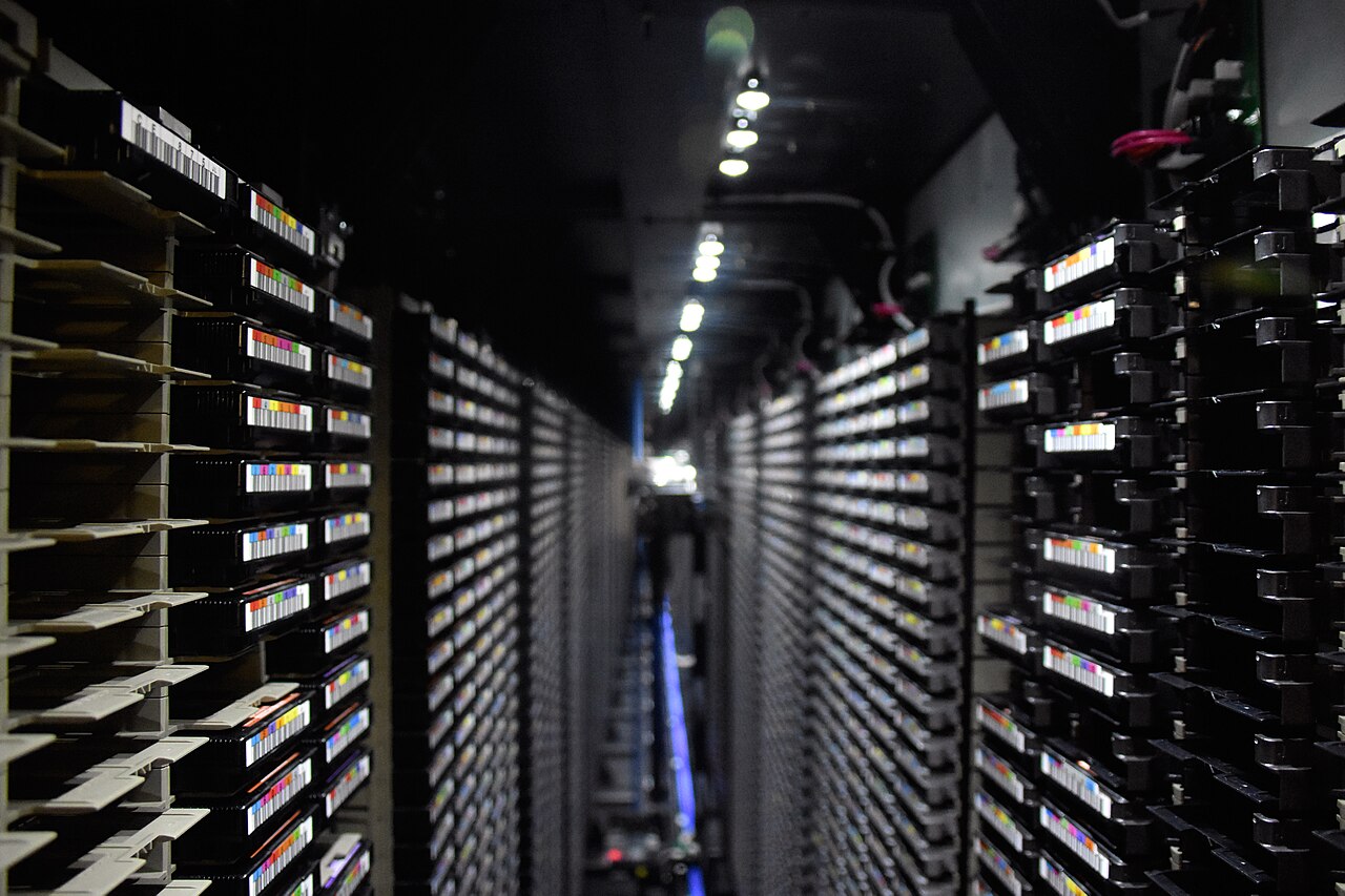 A corridor of dense high-performance server racks